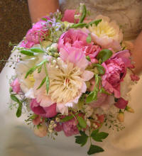 Soft, romantic peonies, bleeding hearts, and sweet peas